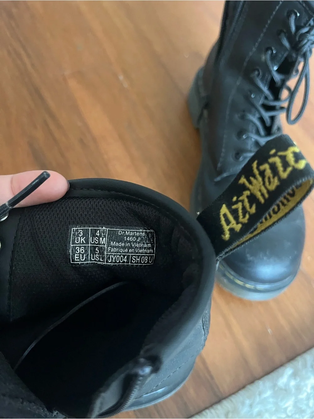 Dr. Martens Black Leather Lace-Up Ankle Boots with Yellow Heel Loop